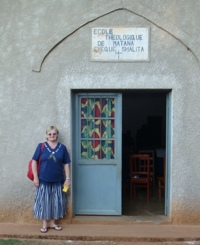 Outside the Bible College in Matana is Lynda Baxter, from 'All Saints' University Street.  All Saints sponsor some of the pupils at the College.