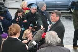 Secretary of State for Defence, The Rt Hon Bob Ainsworth, is questioned by the media outside the Cathedral.