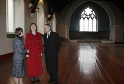 The President and her husband enjoy a laugh while chatting with the Rev Edith Quirey in the currently empty St Luke's building.