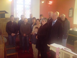 The Lithuanian group joins in worship at Foxford church.