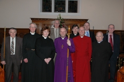  At the institution are church wardens (L to R): Raymond Smith and Jim Mills (Immanuel); Jim Anderson and Stanley Rankin (Holy Trinity and St Silas). Clergy (L to R);  Canon Gregory Dunstan (Rural Dean of Mid Belfast), the Rev Rachel Creighton, Bishop, Rev Clifford Skillen (Bishop's Chaplain), Ven Stephen McBride (Archdeacon of Connor), Rev George Beattie (Curate)