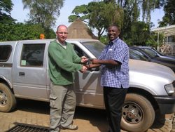 The Rev Alan McCann, Holy Trinity, Woodburn, handing over the keys to a pickup truck to Mr Kennedy Nkolenta, East Africa director for Fields of Life.