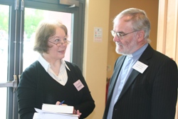 Mrs Evelyn Lewis of the Good Book Shop, in conversation with the Ven Barry Dodds, Archdeacon of Belfast, at General Synod.