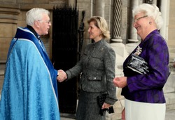 The Dean greets HRH Countess of Wessex and Dame Mary Peters at the Cathedral.
