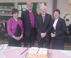 With the anniversary cake at St Stephen's are, from left: Mrs Janet Spence (parish reader), Church of Ireland Primate Archbishop Alan Harper, Canon JTR Rodgers (previous rector) and Rev Edith Quirey (rector).