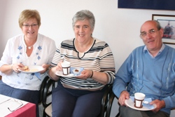 Sylvia Morrow and Rosemary and Jim Patterson support the Macmillan Cancer Support coffee morning.