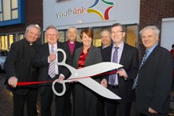 Ministers and clergy including Bishop Michael Jackson cut the tape to open Youthlink's new premises.