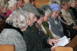 Parishioners get to look at the Jewish Prayer Book.
