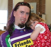 Little Emily is glad to see dad Ernie home from the Tour de Connor!