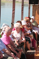 Pilgrims on the Jesus Boat crossing the Sea of Galilee.
