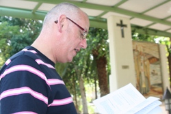 Archdeacon Stephen McBride delivers the last reading of the pilgrimage at the church at Mensa Christi near Tiberias.