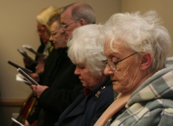 Parishioners worship during the Service of Dedication.