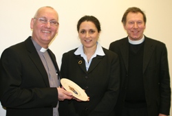 Archdeacon Stephen McBride and Canon John Mann present a Connor plate to Deputy Israeli Ambassador to Ireland, Ms Ruth Zack.