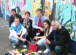 Marion Weir, Duncan Morrow of the Community Relations Council and artits at the launch of the mural.