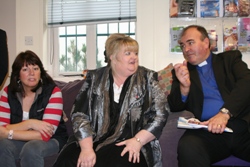 Roberta Coates, co-ordinator of the suicide and self harm team at FASA, Anne Bill, Director, and the Rev John McClure in discussion during the Bishop's visit to FASA.