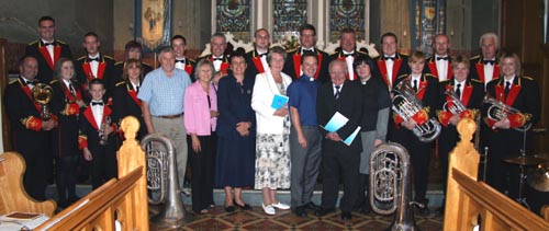 Taking part in ‘Summer Songs of Praise’ were Symington Memorial Silver Band and L to R: John Quigley (Lisburn Cathedral), Lesley Noble (Seymour Street Methodist), Evelyn Whyte - Deaconess (First Lisburn), Edith McConnell (Railway Street), Rev Paul Dundas (Rector of Christ Church), Ernie Hewitt (conductor) and the Rev Diane Matchett (Curate of Christ Church).