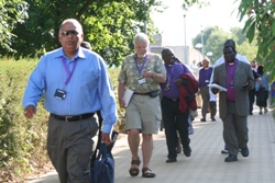 Bishops including the Bishop of Down and Dromore, the Rt Rev Harold Millar (in shorts) make their way to the Big Top for worship.