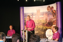 Bishop Phillip Aspinall chairs a press conference flanked by Bishop George Browning and Bishop Katharine Jefferts Schori.