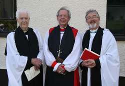 Dean Norman Barr (former rector), Rt Rev Dr Samuel Poyntz (former Bishop of Connor) and the Rev John Budd (present rector) pictured at a Service of Thanksgiving in St Andrew’s Church Hall, Colin on Sunday June 10.