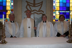 Church of Ireland Primate and Archbishop of Armagh, the Most Rev Alan Harper (second left) with, from left: Harold Sharp, Amanda Adams and Carol Harvey, who were all ordained priests at a service in St Anne's Cathedral, Belfast, on Sunday June 3. 