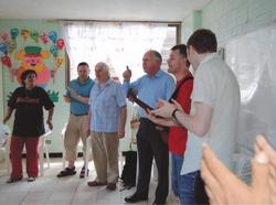 Singing and prayer in a Colombian school.
