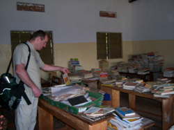 Rev Alan McCann at Kirisa High School in Jinja, which received some of the resources sent to Uganda from Holy Trinity following the closure of Mount Gilbert Community College last year.