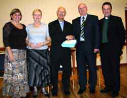 Canon Cochrane is presented with a gift on behalf of the congregation by Mr Wesley Dickinson - Rector’s Warden.  L to R:  Mrs Ann Elliott, Mrs Mildred Cochrane, Canon Cochrane, Mr Wesley Dickinson and the Rev Paul Dundas.