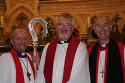 At the re-opening of St Thomas' Parish Church are, from left:  the Rt Rev Alan Abernethy, Bishop of Connor; Canon Walter Lewis, Rector of St Thomas; the Most Revd Alan Harper, Archbishop of Armagh.
