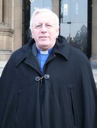 Dean Houston McKelvey outside St Anne's Cathedral during a previous sit-out.