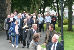 Plenty to chat about as Synod members walk from the service in the church to dinner in the hall.
