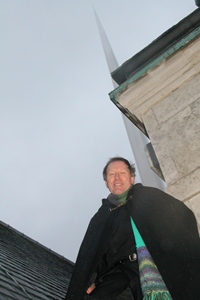 Black Santa, Dean John Mann, takes in the city of Belfast from the roof of St Anne's Cathedral.