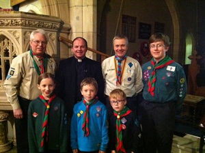 The District Commissioner and rector with representatives of the scout groups at St Bartholomew’s for the anniversary celebration.