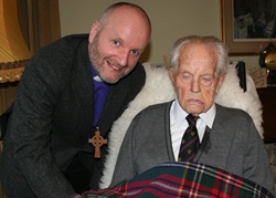 Bishop Alan congratulates Billy Noble, who celebrated his 106th birthday on January 5.