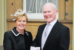 The Rev Campbell Dixon MBE at Buckingham Palace with his wife Jacqui.