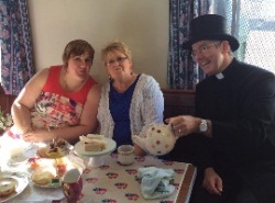 Sonya Taylor and Anne Neil relax at the St Cedma’s Vintage Tea, served by the ‘talented’ Archdeacon Stephen Forde!