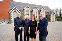 Outside the Old Schoolhouse are, from left: The Rev Brian Howe, curate; the Rt Rev Alan Abernethy, Bishop of Connor; Stella Byrne of the Heritage Lottery Fund, and rector, the Rev Andrew Sweeney.