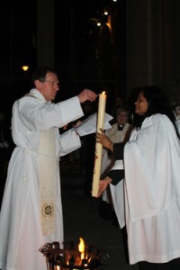 Lighting of the Paschal Candle on the steps of St Anne's Cathedral on Easter Eve.