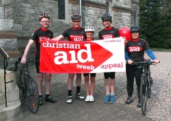 The Rev Jonny Campbell-Smyth, left, with others taking part in the Christian Aid fundraising cycle. Photo courtesy of Newtownabby Times.