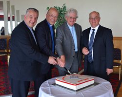 Former Rectors cut the cake. From left: Rev Malcolm Ferry, Rev Roger Thompson (rector), Canon Bill McNee and Mr Tom Irwin (Lay Reader)