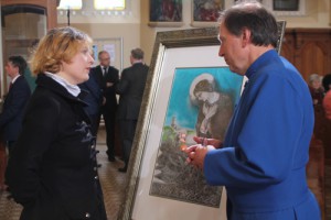 Artist Eve Parnell, whose picture of St Brigid was commissioned by St Patrick's as a gift for the Royal couple, talks about her work to the Dean of Belfast, the Very Rev John Mann.