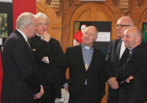 The Bishop of Connor, right, chats with Depute First Minister Martin McGuinness, Bishop Noel Treanor, Methodist President the Rev Peter Murray, and the Rev Rob Craig of the Presbyterian Church while waiting for the Royal guests to arrive at St Patrick's RC Church.