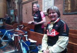St Patrick’s parishioners Ian Cochrane and Alex McClenaghan in church with their bikes.