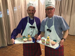 Displaying their cupcakes are the Bishop of Connor and the Archdeacon of Connor.
