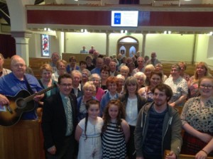 The Rev Paul Dundas, rector of Christ Church, Lisburn, with participants in the 'Thanks and Praise' roadshow.