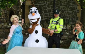 Oops - looks like Olaf got on the wrong side of the law at the St Colmanell's fair! Elsa and Anna are aghast!