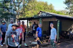 Flute Band Church members hard at work fixing up a house that doubles as a Church in Concepción, Paraguay.