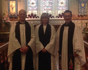 The Rev Julie Bell is welcomed to Christ Church, Lisburn, by the Rev John Pickering, left, and the Rev Paul Dundas, rector.
