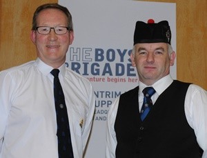 Pipe Major John Fittis (Major Sinclair Memorial Pipe Band) and Drew Buchanan MBE (President of the East Antrim Battalion). Both are members of Holy Trinity Woodburn which hosted the fundraising concert.