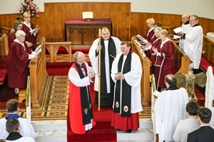 Introduction of the Rev Canon James Carson by Bishop Alan Abernethy. The Rev John McClure is also in the photo. Picture by Norman Briggs.