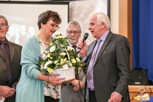 Mrs Heather Carson receives a bouquet from the Select Vestry, presented by Stanley Gamble.